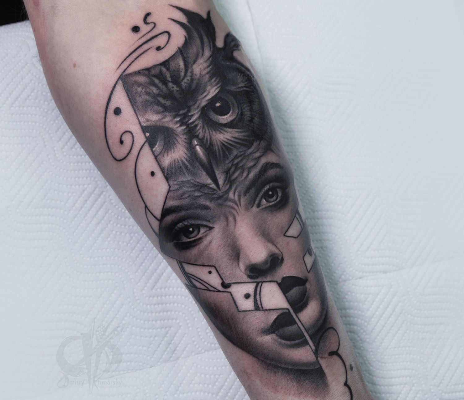 Black and grey ornamental tattoo detail